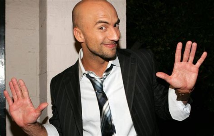 See What the Dancing Six Flags Old Man Really Looks Like — Best Life